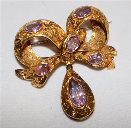 A Victorian gold and amethyst drop bow brooch, 2in.